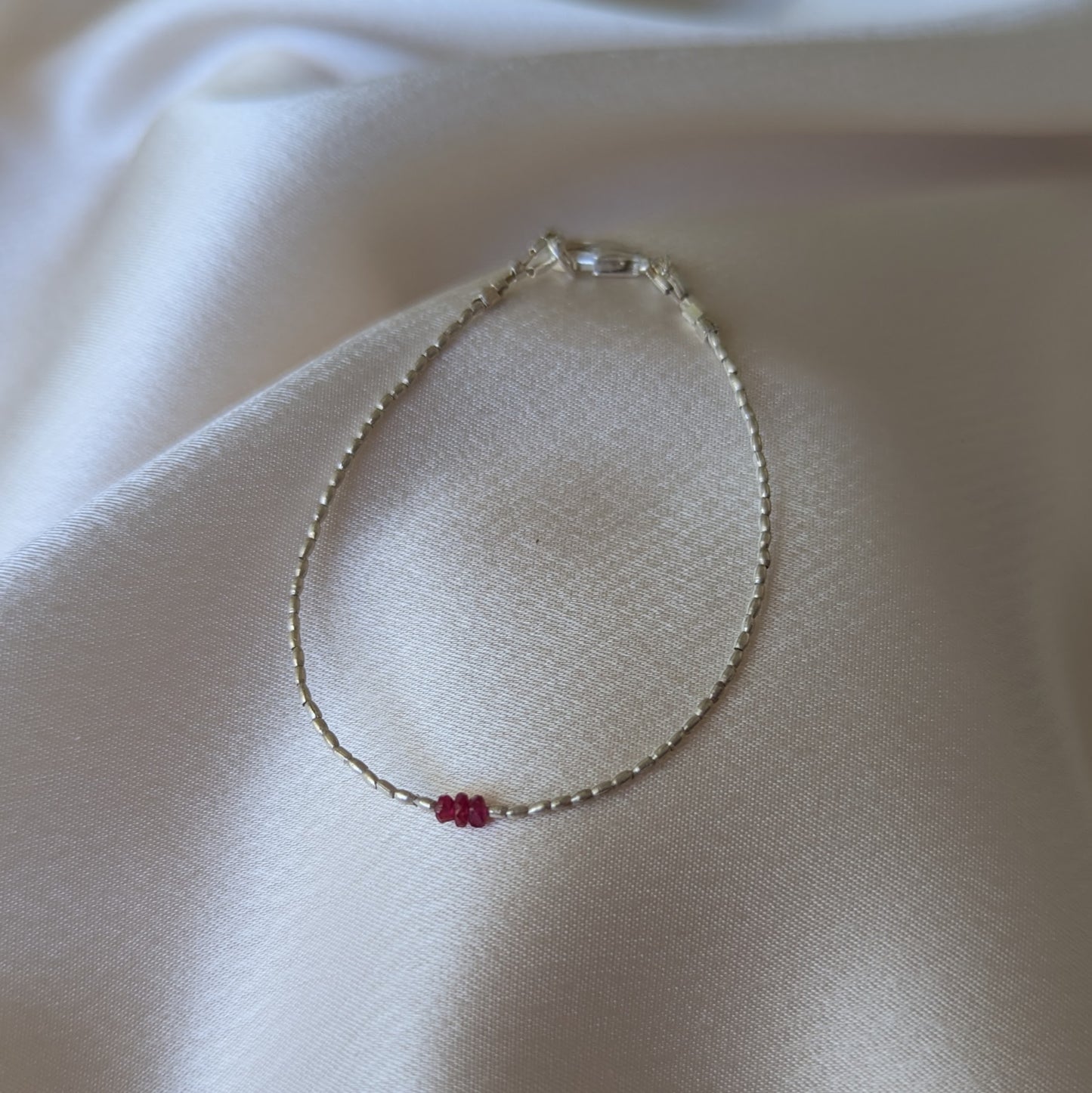 Sidhe silver and ruby bracelet
