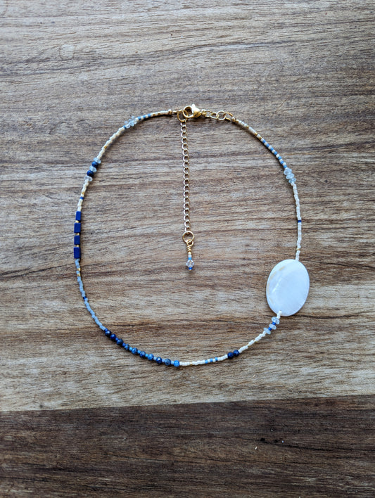 choker necklace with lapis lazuli and aquamarine gemstone and a shell bead