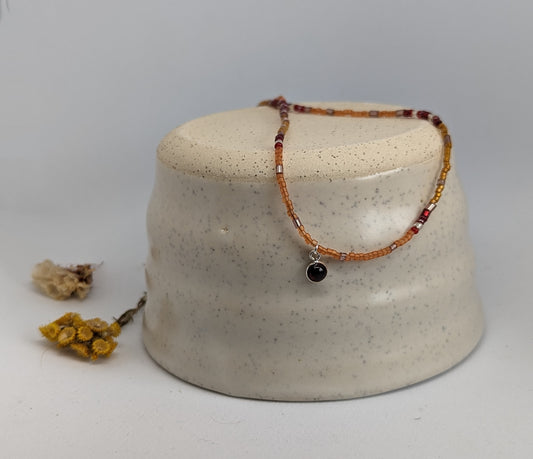 single strand necklace with garnet and Miyuki glass beadsrom Miyuki beads 